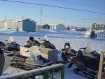 A snowmobile parking lot outside the Fort Severn band office.