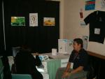Wesley showing the KNET and Telehealth websites to an interested conference delegate