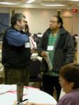 KO's Brian Walmark discusses ICT use to promote traditional languages with ALI's co-chair Amos Keys at the Sweetgrass Language C