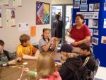KO staff teaching traditional arts and crafts to Balmertown school children during National Aboriginal Day 2004 033
