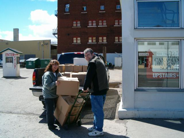 Heather and Brian unloading books from Sterling Hall School 002
